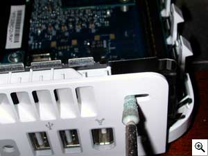 Use a dremel to open a circular hole in the back. Make sure to use a
screw driver to remove any excess plastic